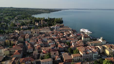 aerial shot of the vintage city with european architecture with a river channel flowing through the city