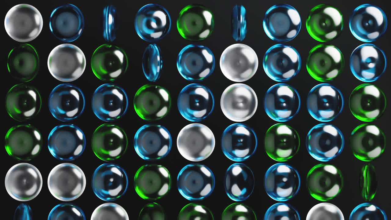 Seamless Loop of Spinning Colorful Orbs on Black Background