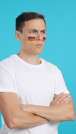 german patriot man looking away with serious expression