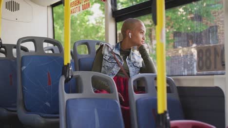 mixed race woman taking the bus