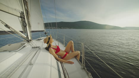 woman relaxing on a yacht deck