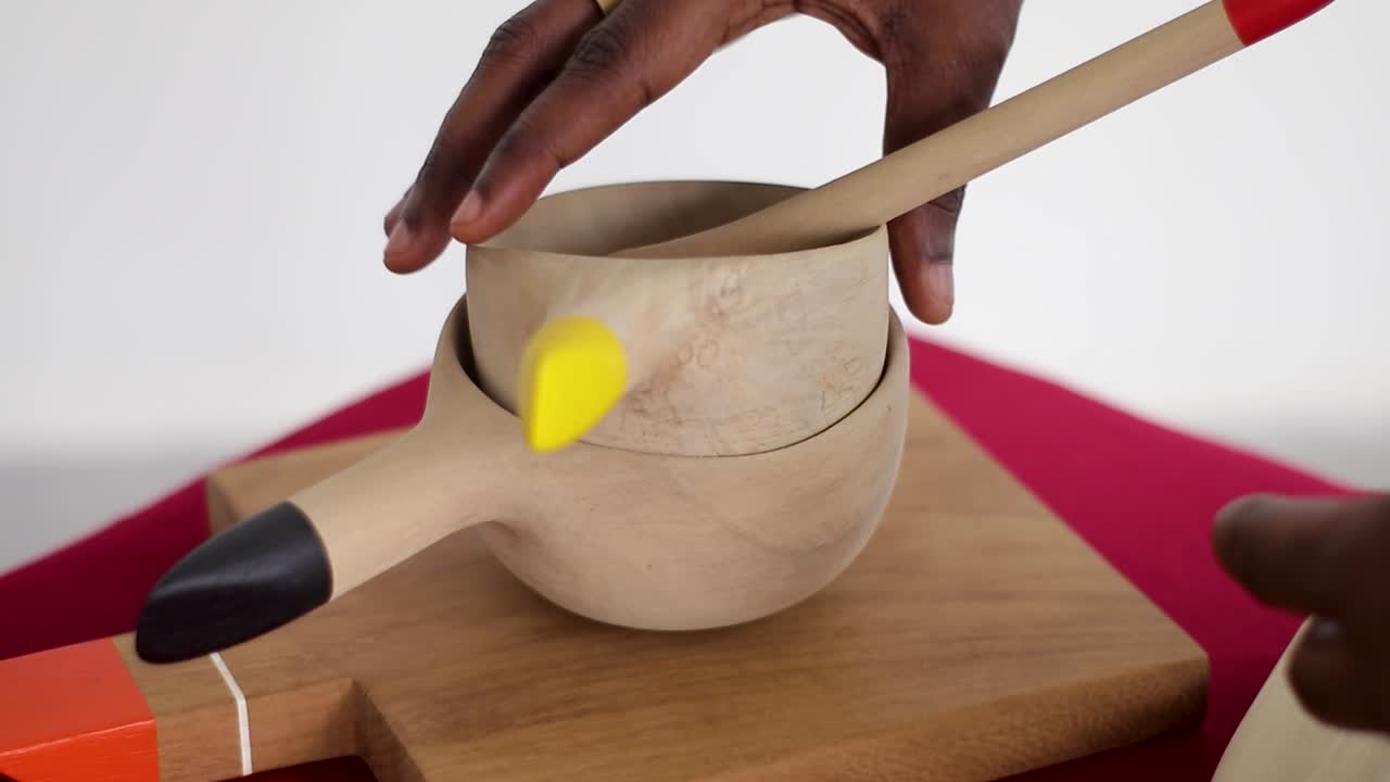 isolated wooden kitchen utensils on a platform