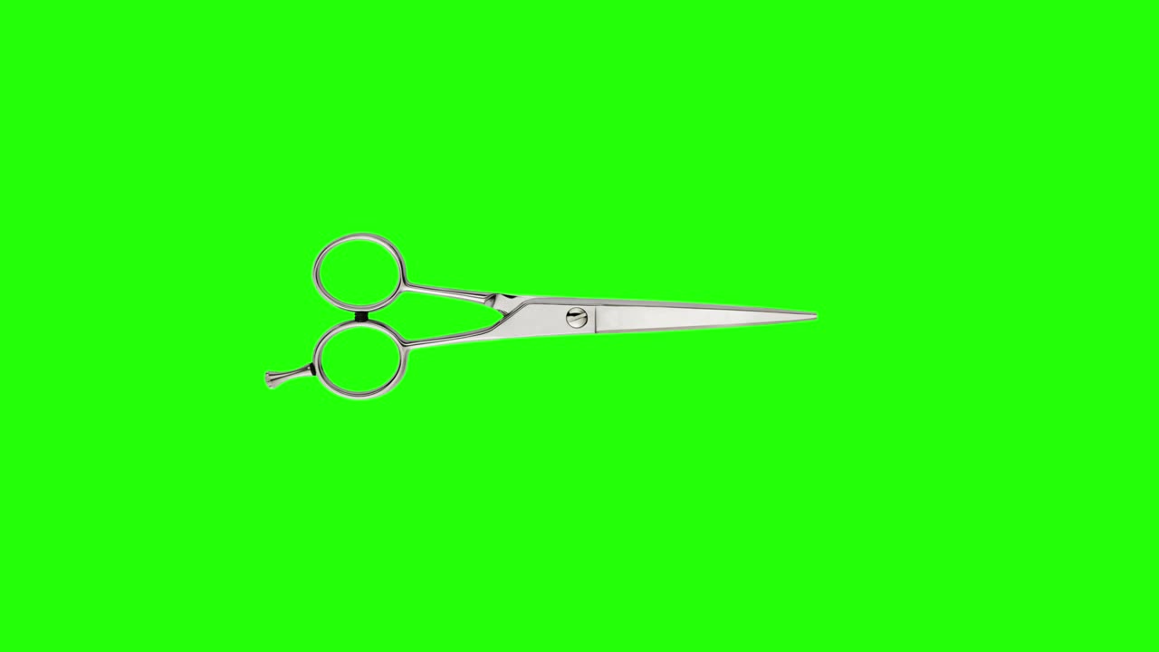 Scissors opens and closes on green chromakey background