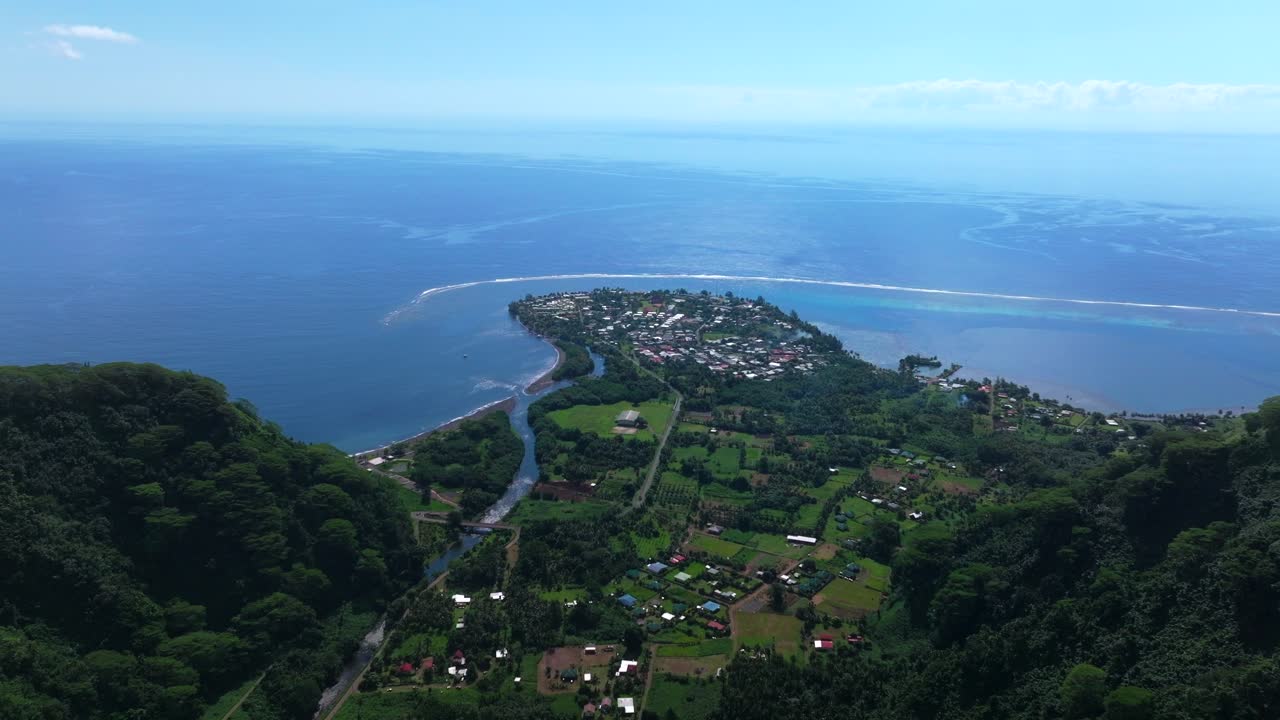 Tautira Bay North Shore Tahiti island French Polynesia aerial drone Vallee de Teahupoo Taiarapu Papara Tavera Vaitepiha River village town South Pacific Ocean forward pan up motion