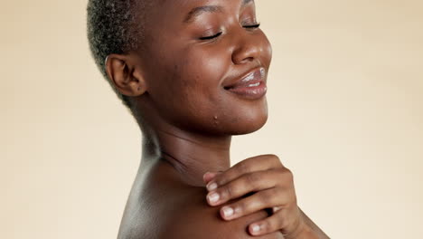 Skincare,-beauty-and-hands-of-black-woman-on-face