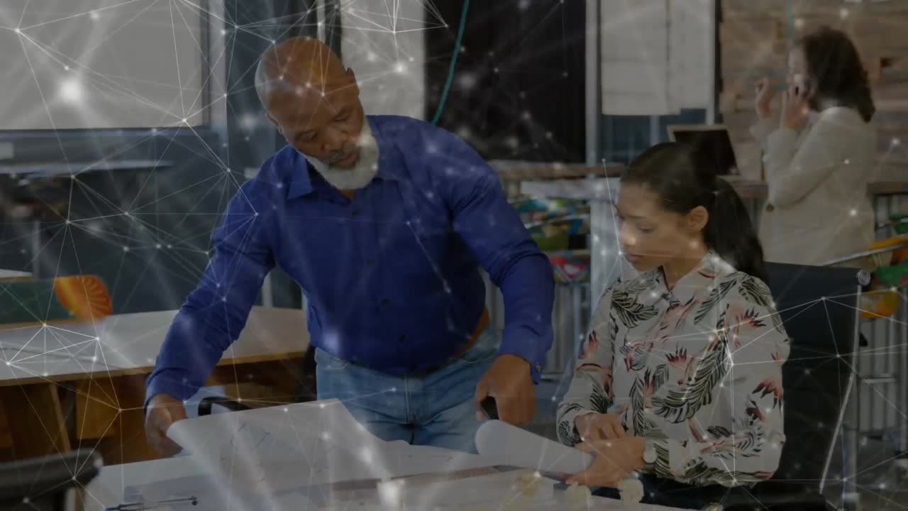 Animation of networks of connections over diverse business people talking in office