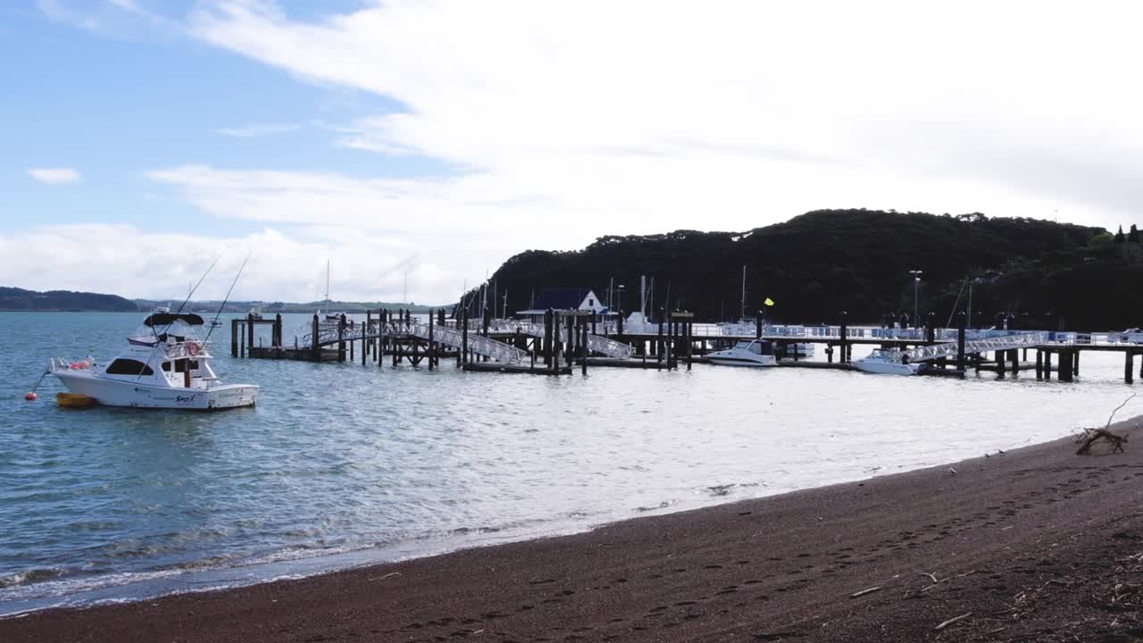 The historic Russell township with beautiful scenic ocean view, boats moored, fine day in Far North, Bay of Islands, New Zealand. Popular holiday destination for tourist and Kiwis in Aotearoa