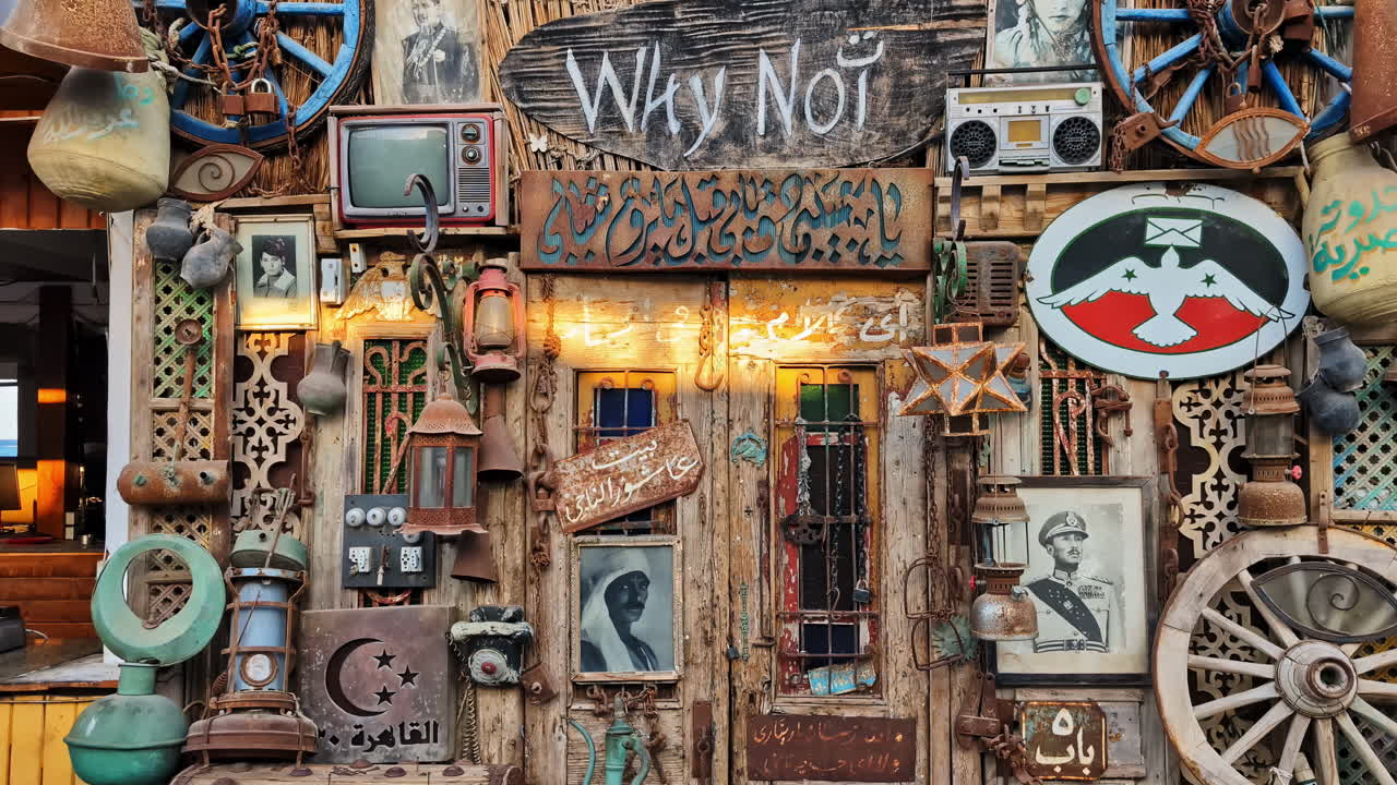 Discover a captivating memorabilia wall adorned with an array of vintage items and local artifacts, creating a nostalgic atmosphere that reflects the culture and history of the area.