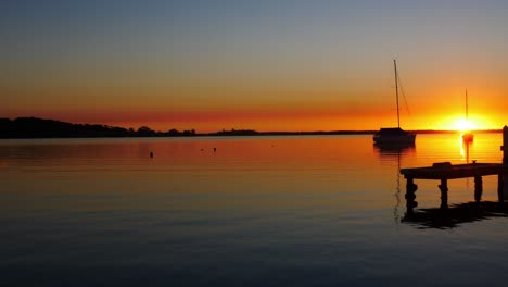 sailing boats and yachts floating on lake macquarie new castle
sunrise sunlight reflection over thje lake