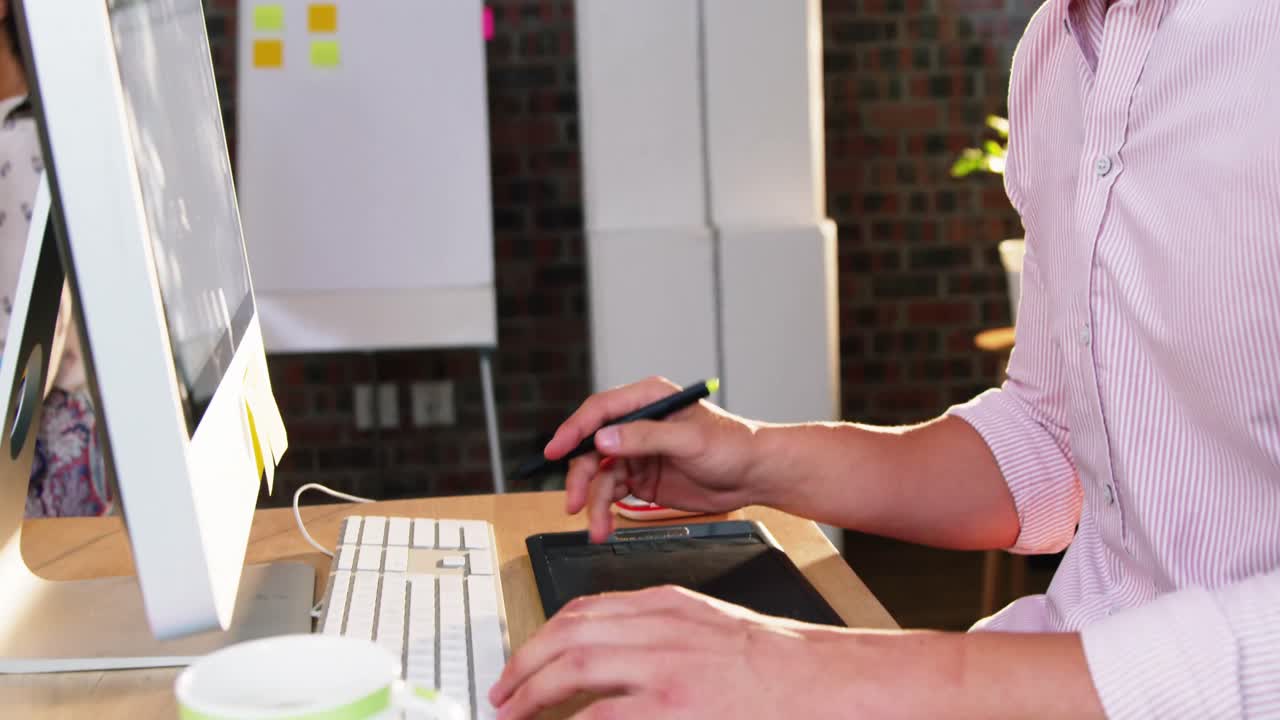 Graphic designer using graphic tablet