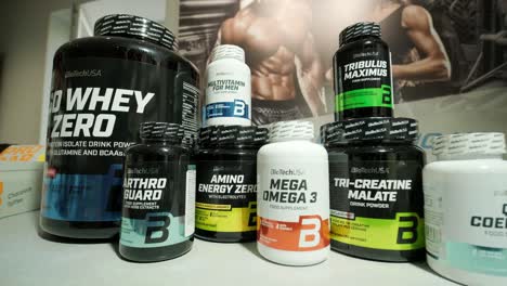 sport nutrition store interior with large choice of nutritional supplements.