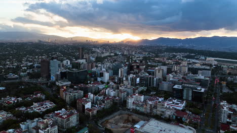 Aerial-view-over-the-cityscape-of-Polanco,-dramatic-evening-in-Mexico-city