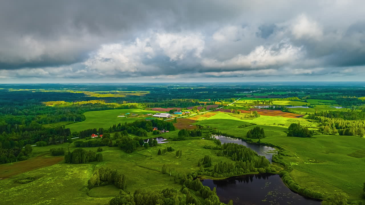 Dense Clouds Passing Over Countryside Landscape. Timelapse