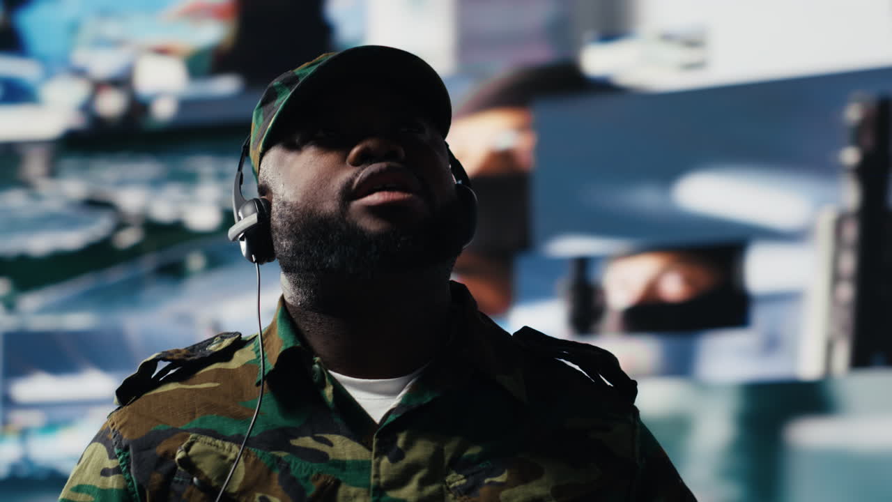 Black soldier guiding troops with satellite coordinates to create tactics