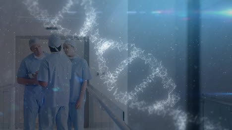 dna structure spinning against three male medical professionals discussing at hospital