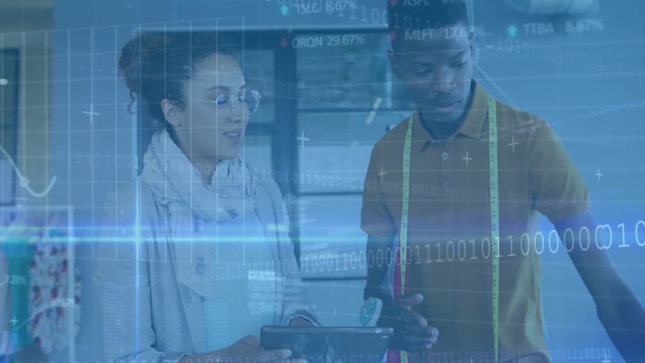 woman holding tablet under intensifying overlay and fashion designer lifting fabric examining print