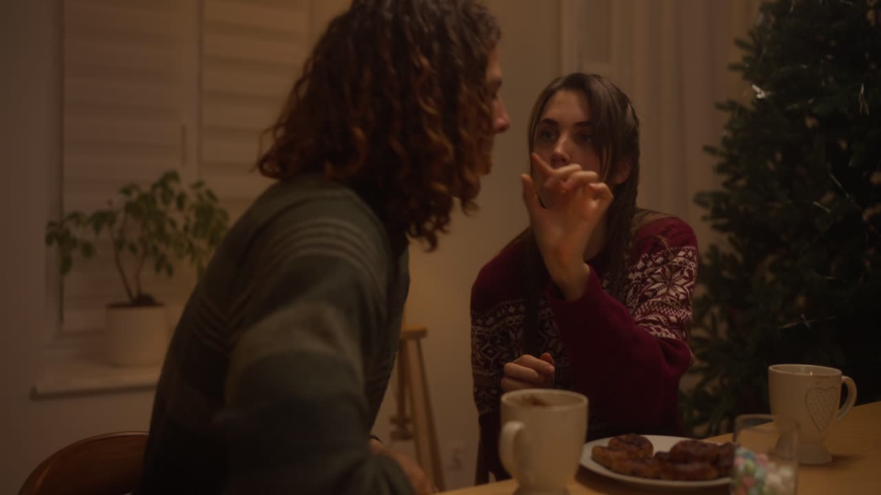 Couple enjoying Christmas dinner at home