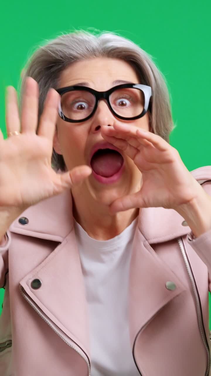 Expressive Mature Woman Shouting and Calling Out on Green Screen