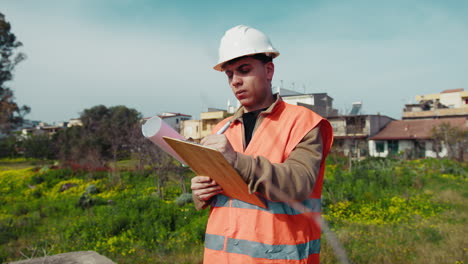 sunny day at work for an engineer taking notes
