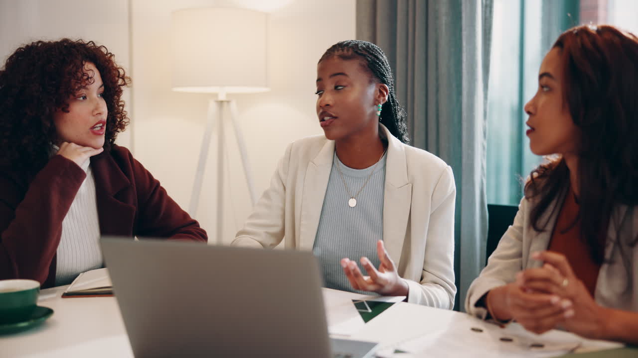 Three women in a business meeting