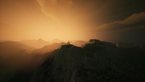 High-mountain-peaks-covered-with-dramatic-heavy-fog