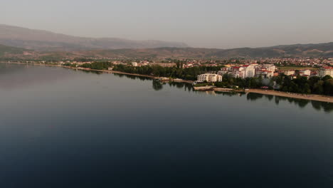 astonishing aerial view cityscape of pogradec. scene over ohrid lake. albania, europe.