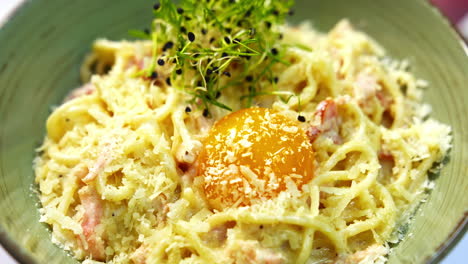 bowl with salad in beautiful decoration. diet lunch on a plate. delicious dish with green sprinkle. healthy foods with vitamins. close-up.
