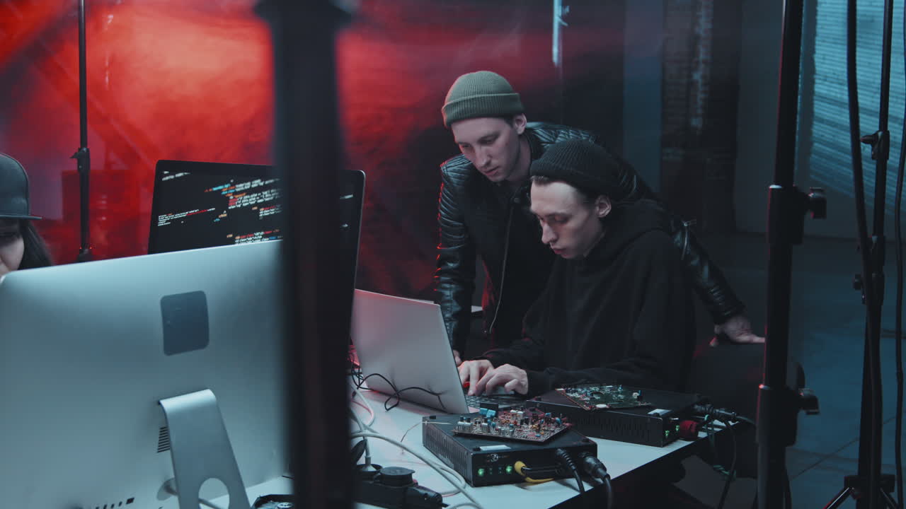 Young People Hacking and Stealing Data in Hideout