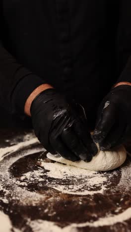 chef kneading dough