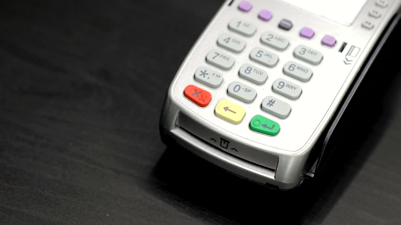 Close-up shot of person using mobile payment PayPass