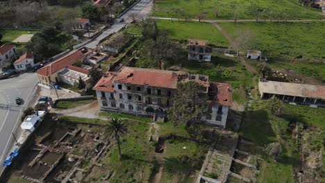 a circle drone video of the now abandoned hotel of sarliza palace