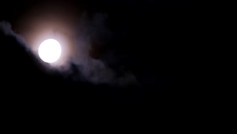 A yellow moon shines with clouds in a dark sky 4k 2025 08 04 21 35 03 utc.mov | against, astrology, atmosphere, background