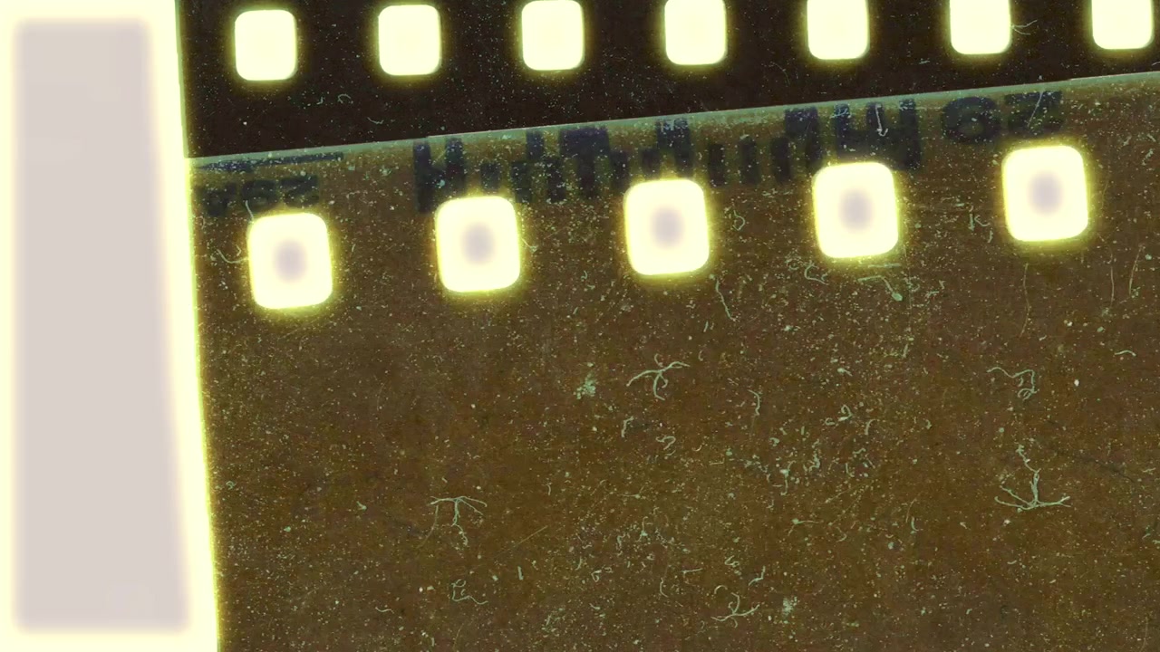 ほこりや傷が付いた、ビンテージのフィルムストリップ動画