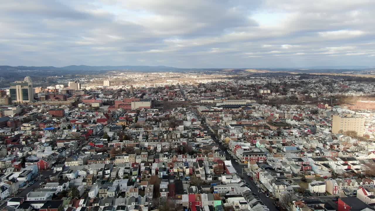 Downtown City of Reading, PA, USA, urban rowhomes packed tightly in low income, poverty, high crime area where mob and mafia once ruled, high aerial view