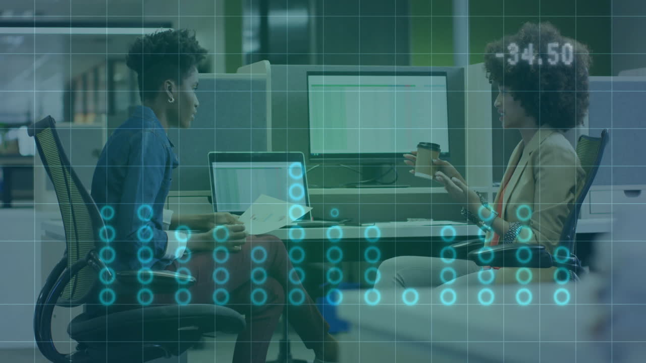 Animation of diagrams over diverse female colleagues talking in office