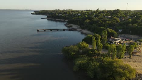 rising aerial view over river plate, fray bentos, uruguay