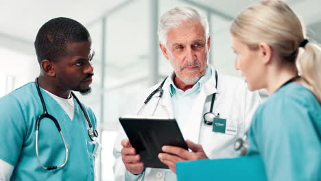doctors and nurses discussing patient care