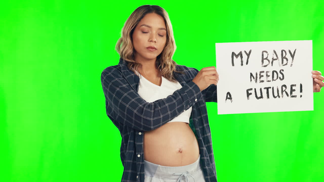 활동주의, 표지판과 녹색과 함께 스튜디오에서 여성