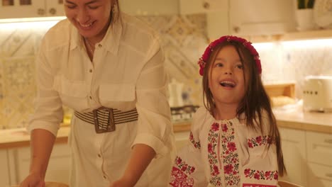 mother and daughter preparing for christmas celebration