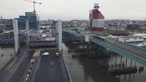 construction of new bridge next to old gota alv bridge over river in gothenburg, sweden