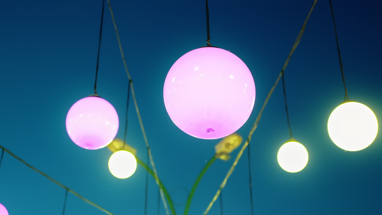 Decoration lights at wedding. Open-air, dusk