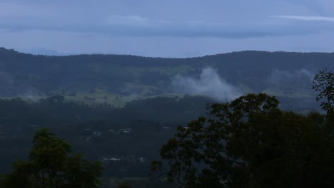 fog blankets mountains in serene progression