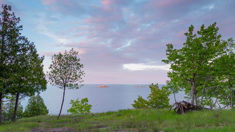 Sunset-light-on-clouds-above-Lake-Superior,-4K-time-lapse