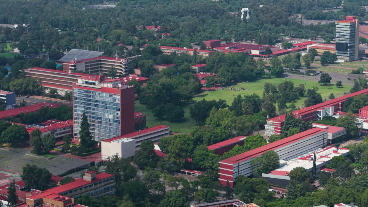 Aerial trip over University City campus of UNAM on a clear, sunny afternoon
