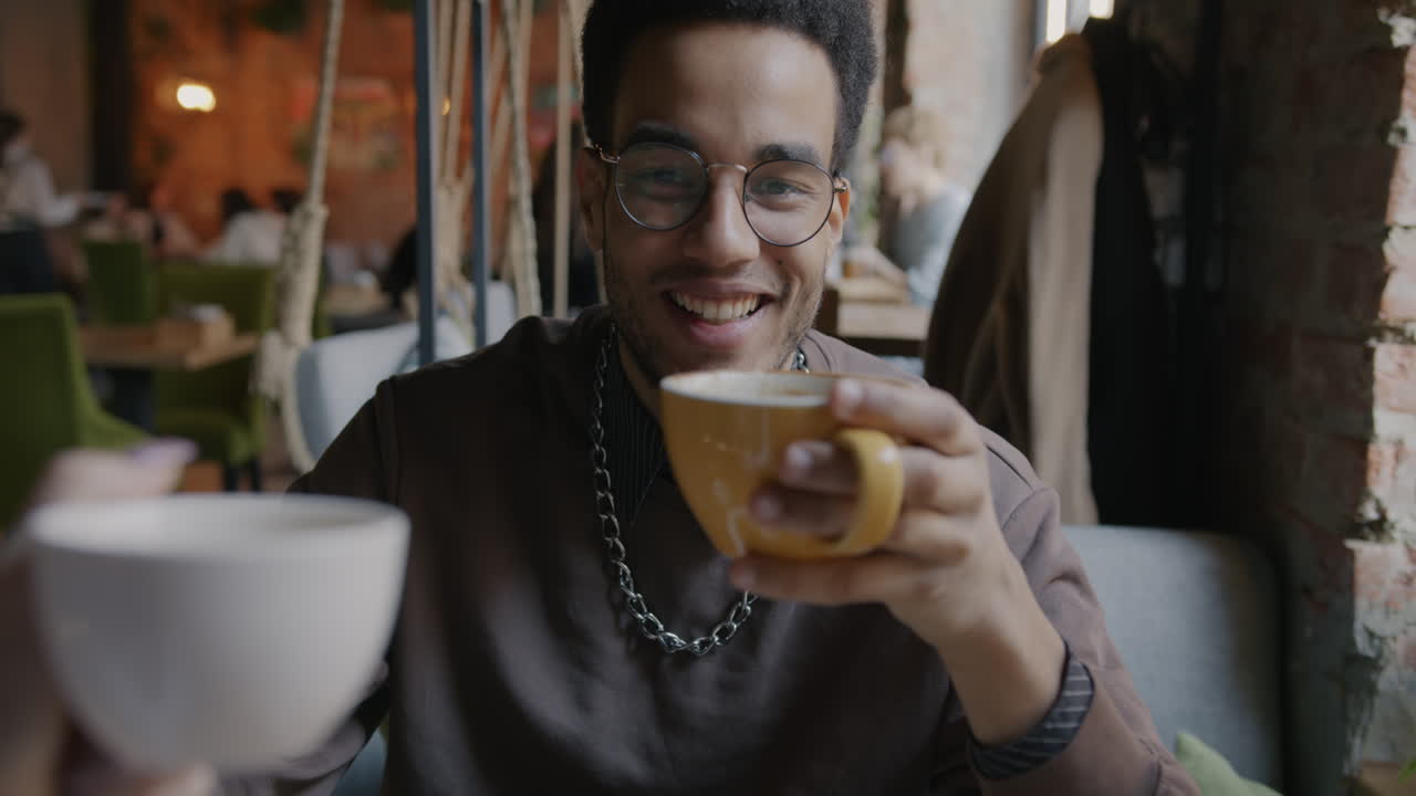 Man enjoying coffee at a cafe