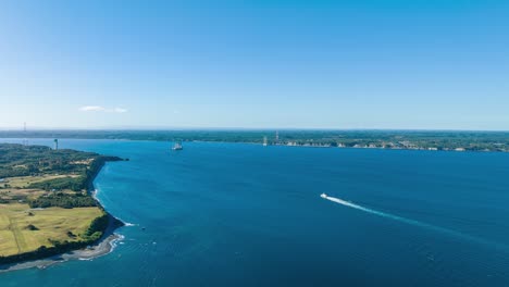 aerial hyperlapse of the chacao channel with the pillars under construction of the future bridge that will cross the chacao channel