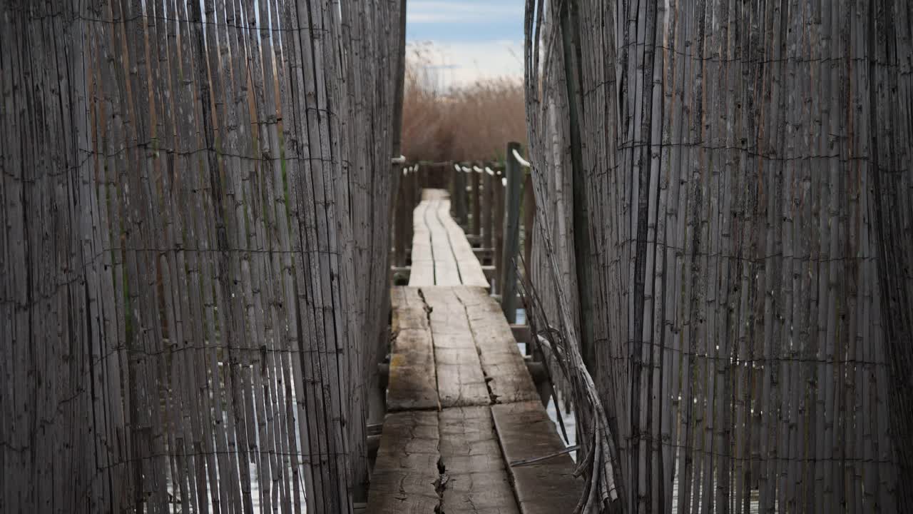 Wooden walkway of a bird observatory in El Hondo, Elche, Spain