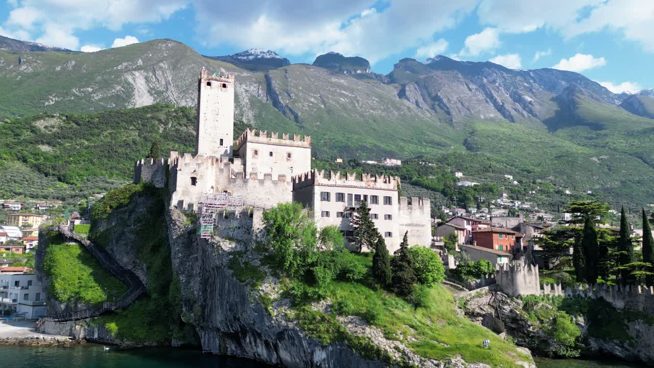 Majestic Castello Scaligero di Malcesine In Malcesine, Province Of Verona, Italy. Aerial Wide Shot