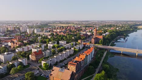 aerial cityscape of malbork, gothic town hall water tower and church poland