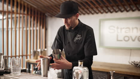 bartender preparing cocktails at a bar